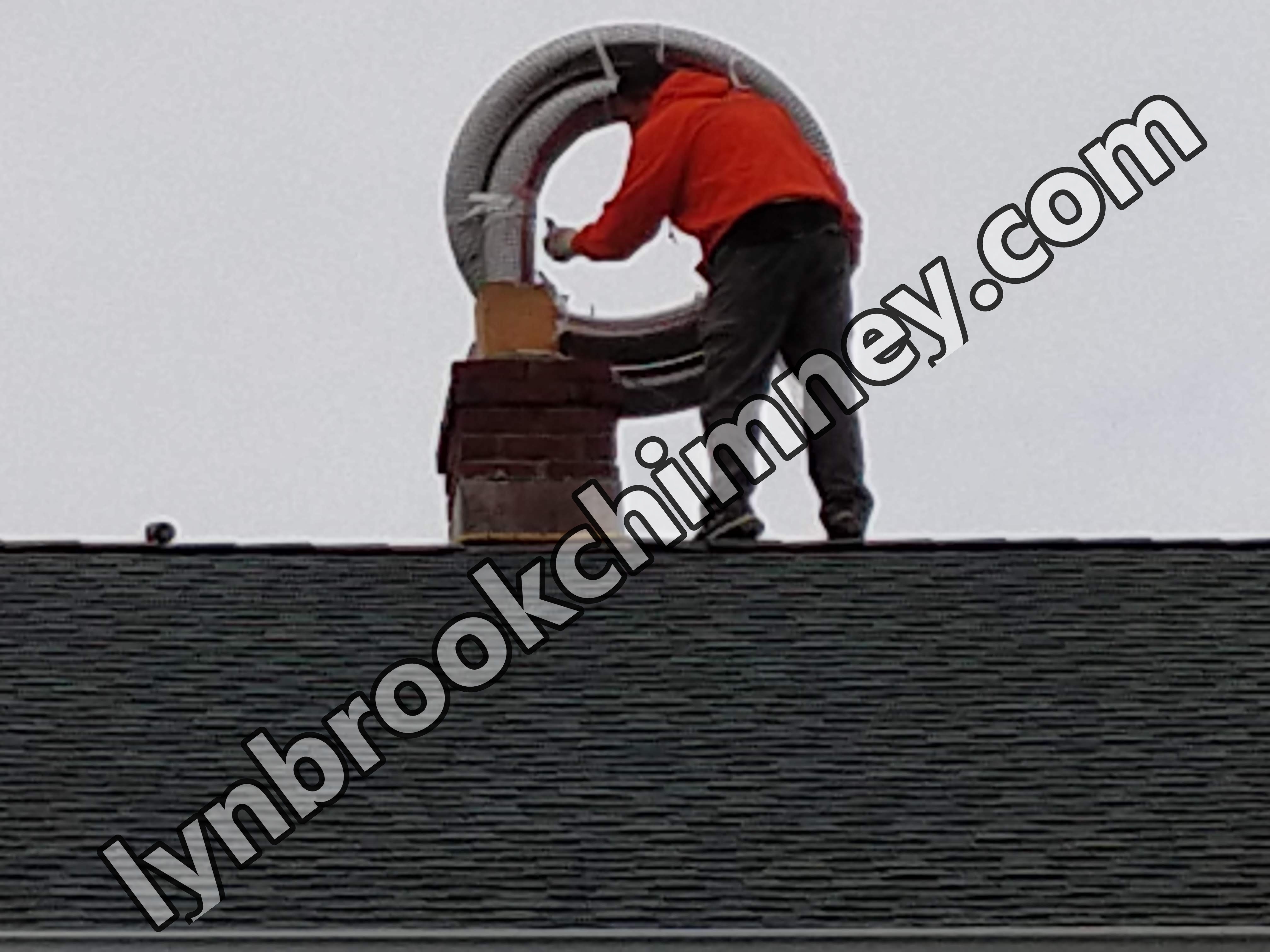 Flexible stainless chimney liner being installed in Lynbrook, New York