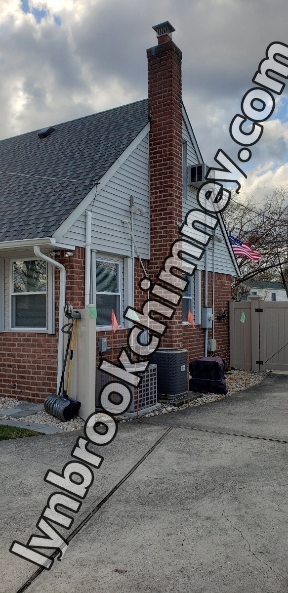 Professional chimney repointing restoring brick joints in Lynbrook, NY