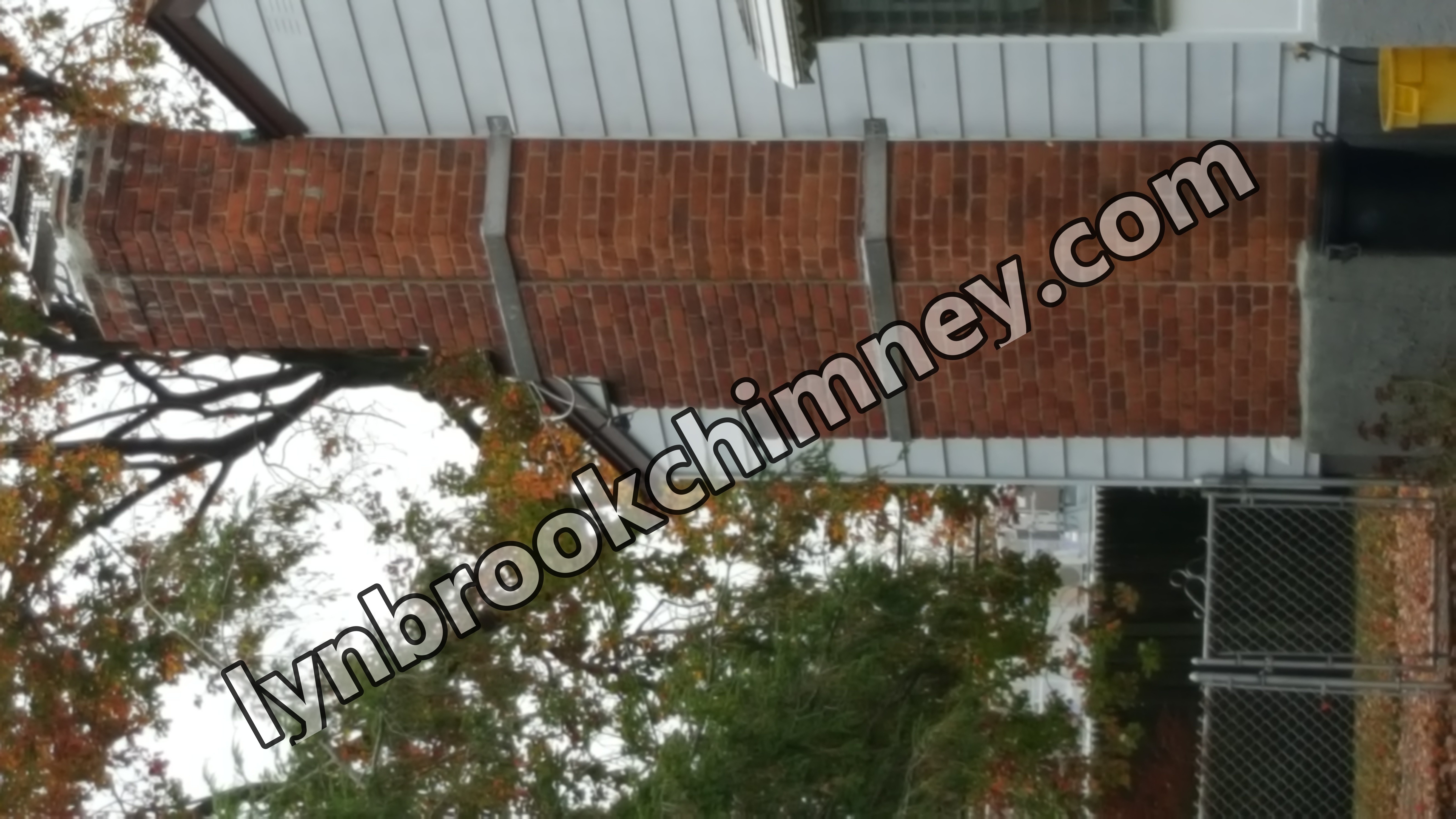 Heavy oil soot removal from chimney flue in Lynbrook, New York
